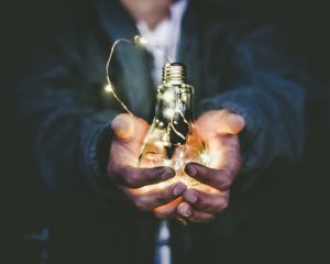 Innovate bulb in hand